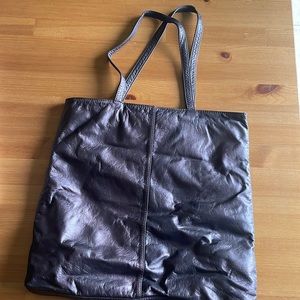 Daniel Genuine leather handbag. Purple/brown litmus colour. Never used.